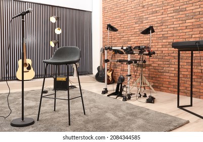 Modern Music Studio Interior With Different Electronic Instruments
