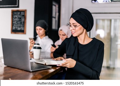 Modern Muslim Business Women Working In The Office