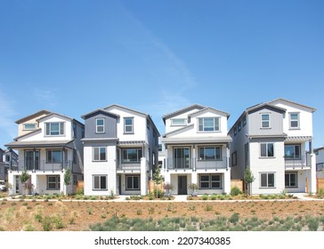 Modern Neighborhood, New Homes In Northern California With A Blue Sky In The Background. American Dream Homes