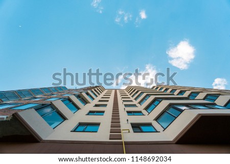 Modern and new apartment building. Multistoried, modern and stylish living block of flats.