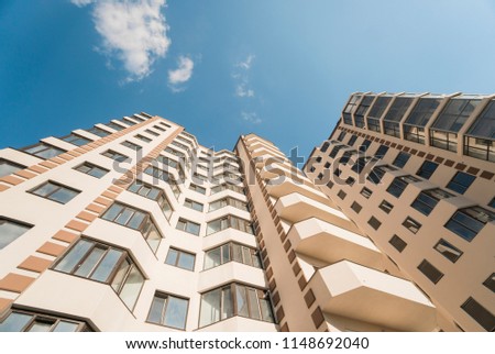 Modern and new apartment building. Multistoried, modern and stylish living block of flats.