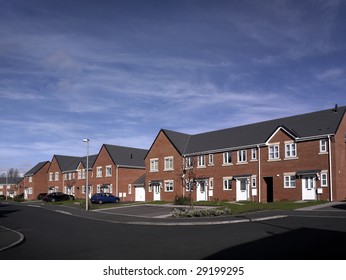 Modern New Build Street Scene Of Terrace Houses In The UK