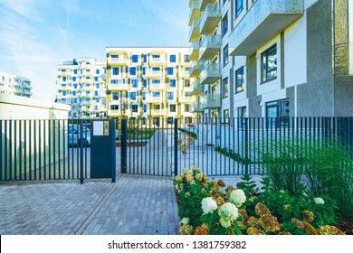 Modern New Residential Apartment House Building With Entrance Gate Concept.