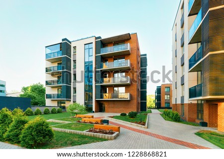 Modern new residential apartment house building complex, with outdoor facilities concept. With benches Stock foto © 