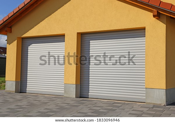 Modern new rolling garage\
doors