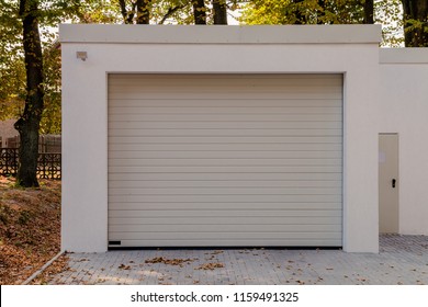 Modern New White Garage With Roller Shutter