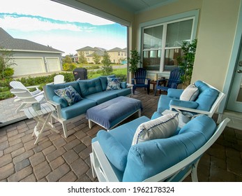 A Modern Nicely Decorated Cozy Outdoor Lanai  In A New Home In Florida.