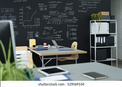 Modern Office With A Black Wall In Background