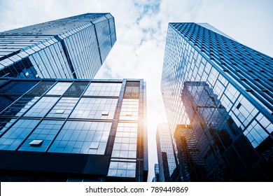 Modern office building against blue sky - Shutterstock ID 789449869