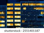 Modern office building facade at night