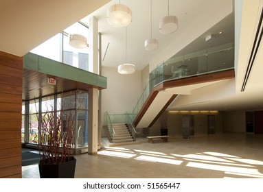 Modern Office Building Lobby In Marble, Glass And Mahogany