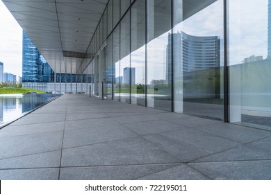 modern office building reflected on clean glass wall, china.