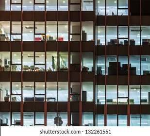 Modern office building in urban city at the night.