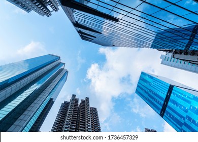 Modern office buildings in central Hong Kong with cloud sky background