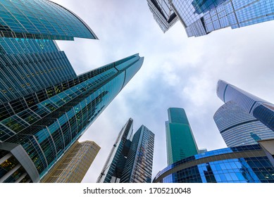 Modern Office Buildings In The Financial District, View Up. Dark, Stormy Sky.