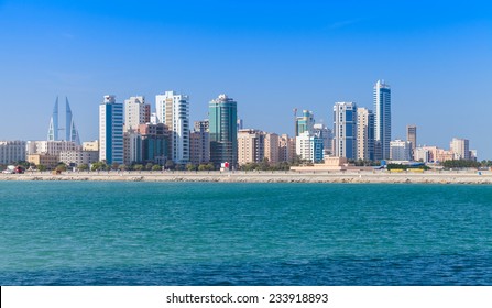 Modern office buildings and hotels in the sunny day. Skyline of Manama city, Bahrain
