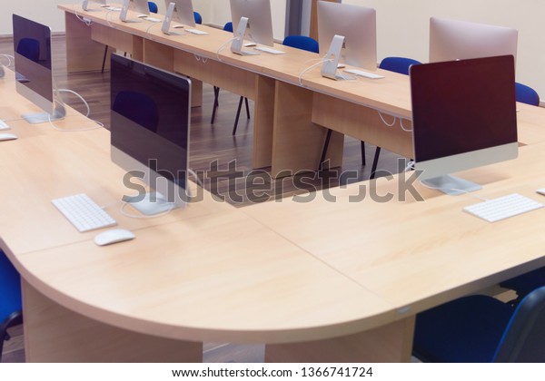 Modern Office Computers On Desks Empty Stock Photo Edit Now