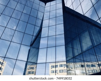 Modern office Corporate business glass building and blue sky