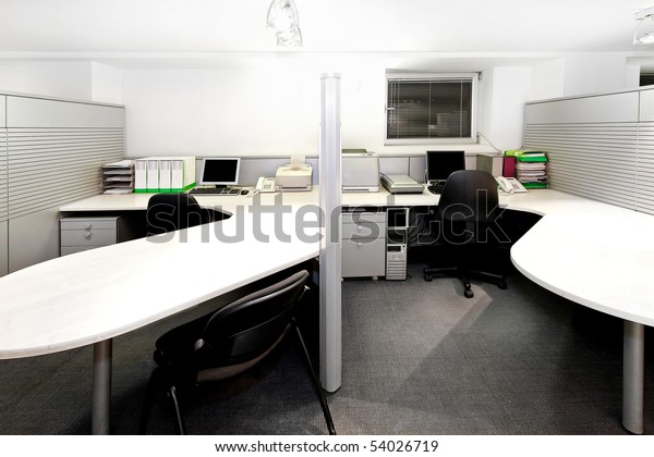 Modern\
office cubicles divided with folding\
screens