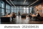 Modern office with employees collaborating around a table in a glass-walled space. The urban backdrop and open design evoke professionalism and teamwork.