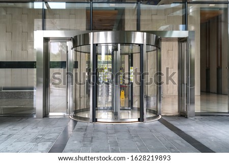 Modern office entrance glass revolving door