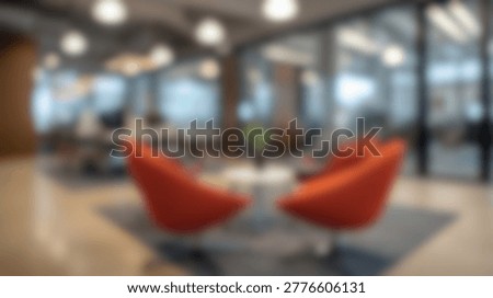 A modern office interior featuring two stylish orange chairs in a waiting area with a blurred background of the office space. The image conveys a sense of comfort and contemporary design.