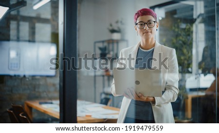 Similar – Image, Stock Photo Charming non binary looking through ring lamp near eyeshadow