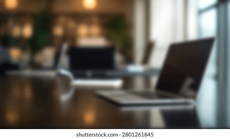 A modern office setting with laptops placed on a wooden table, creating a professional and productive atmosphere.