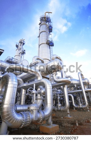 Modern oil and gas processing facility featuring advanced industrial pipelines, refinery towers, and energy infrastructure designed for efficient production, operational reliability, and sustainable industrial performance.