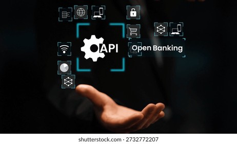Modern Open Banking Concept With API Integration And Digital Security Symbols Displayed Over A Businessman Hand Gluon.
