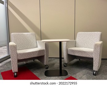 Modern Open Concept Collaborative Work Office Environment With Modular Furniture And White Sofa Chairs With Wheels Layout For School, Business, Hospital