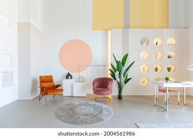 modern open-plan room interior in futuristic style in pastel colors with graphic wall decoration. very high ceilings and a huge window. soft stylish furniture with gold metallic elements