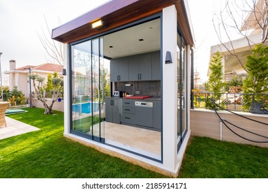 Modern Outdoor Kitchen In The Garden Of The Modern Villa