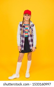 Modern Outfit. Rebellious Teen. Street Style. Cool Schoolgirl. Have Fun Charismatic Girl On Yellow Background. Tomboy Concept. Teen Age. Girl Adorable Stylish Outfit Teenager. Comfortable Outfit.