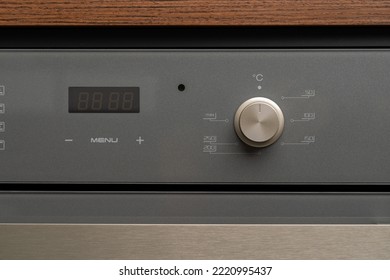 Modern oven mode control button close up