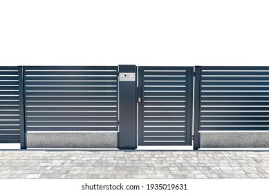 Modern panel fencing in anthacite color, visible wicket with videophone, isolated on white background with a clipping path, with space for text at the top. - Shutterstock ID 1935019631