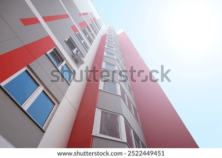 Modern panel multi-storey building bottom-up view. Modern view of the facade outside the house in a modern quarter