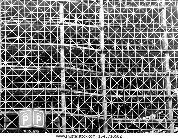 Modern parking lot building with abstract design\
black and white