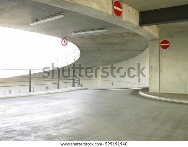A\
modern parking spot with a smooth modern parking\
space.