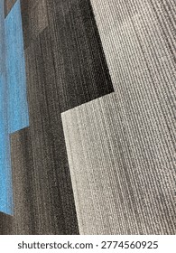 Modern patterned carpet flooring interior showing geometric design and commercial flooring texture detail