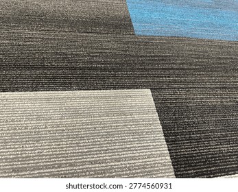 Modern patterned carpet flooring interior showing geometric design and commercial flooring texture detail