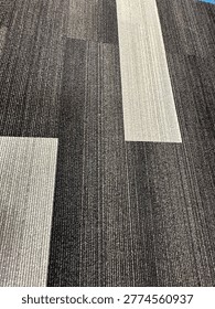 Modern patterned carpet flooring interior showing geometric design and commercial flooring texture detail
