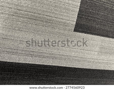 Modern patterned carpet flooring interior showing geometric design and commercial flooring texture detail