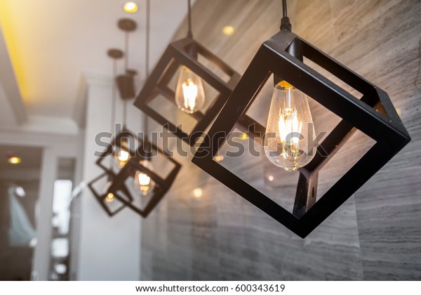 modern pendant\
light with vintage light\
bulb