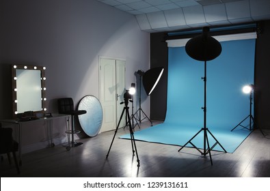 Modern photo studio interior with professional lighting equipment - Shutterstock ID 1239131611