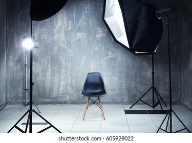 Modern photo studio interior with professional lighting equipment