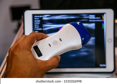 Modern portable ultrasound machine in clinic laboratory of sonography diagnostics