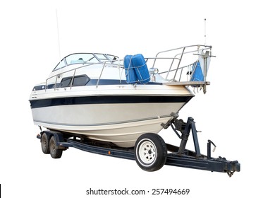 Modern powerboat on the trailer for transportation isolated on a white background