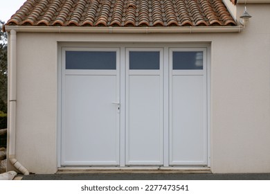 modern private house suburb with garage white polyvinyl chloride door pvc entrance