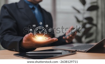 Modern Professionals Hand Projects Tech driven Business Interface In His Office, Displaying Clock Icon With Real-time Data For Future-proof Business Operations